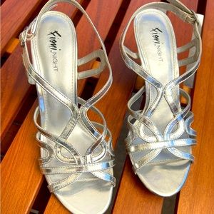 Beautiful detailed silver size 7 heels!